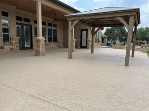 Spacious patio with pergola on concrete flooring