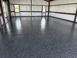 Empty room with polished concrete floor and white walls.
