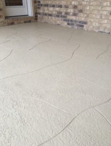 Textured concrete floor with wave patterns