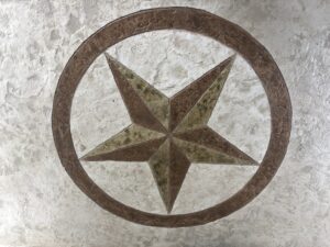 Decorative star emblem on textured surface