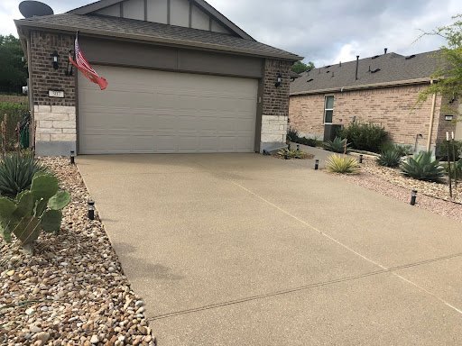 House with landscaped driveway and garden
