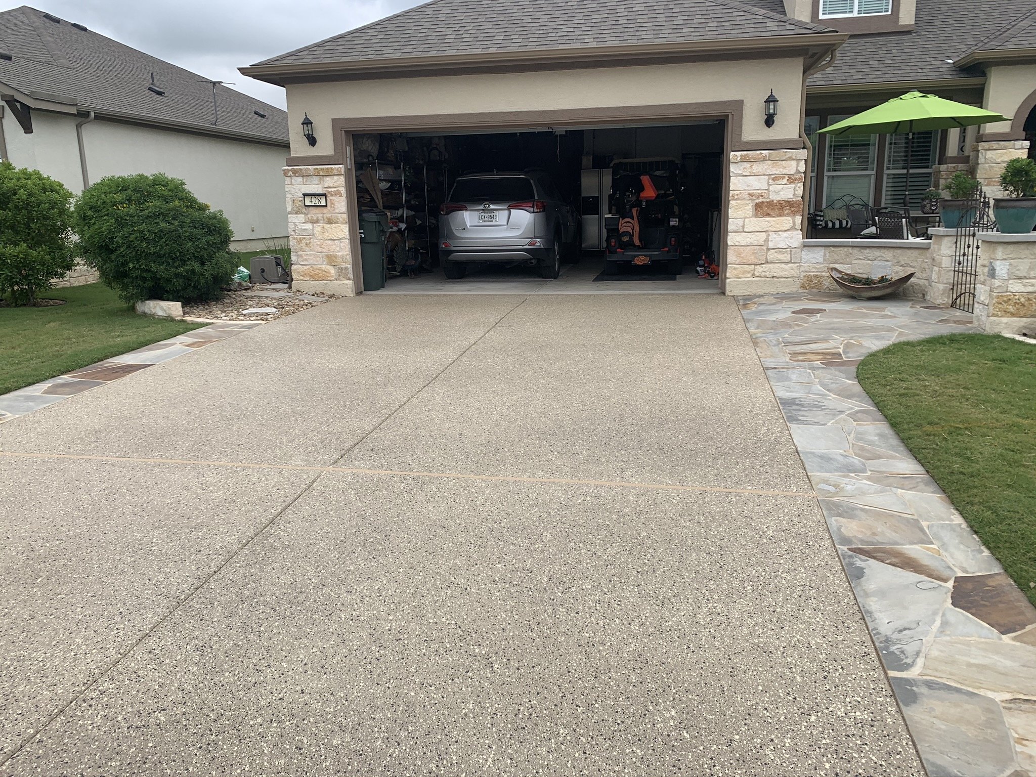 House with garage and concrete driveway