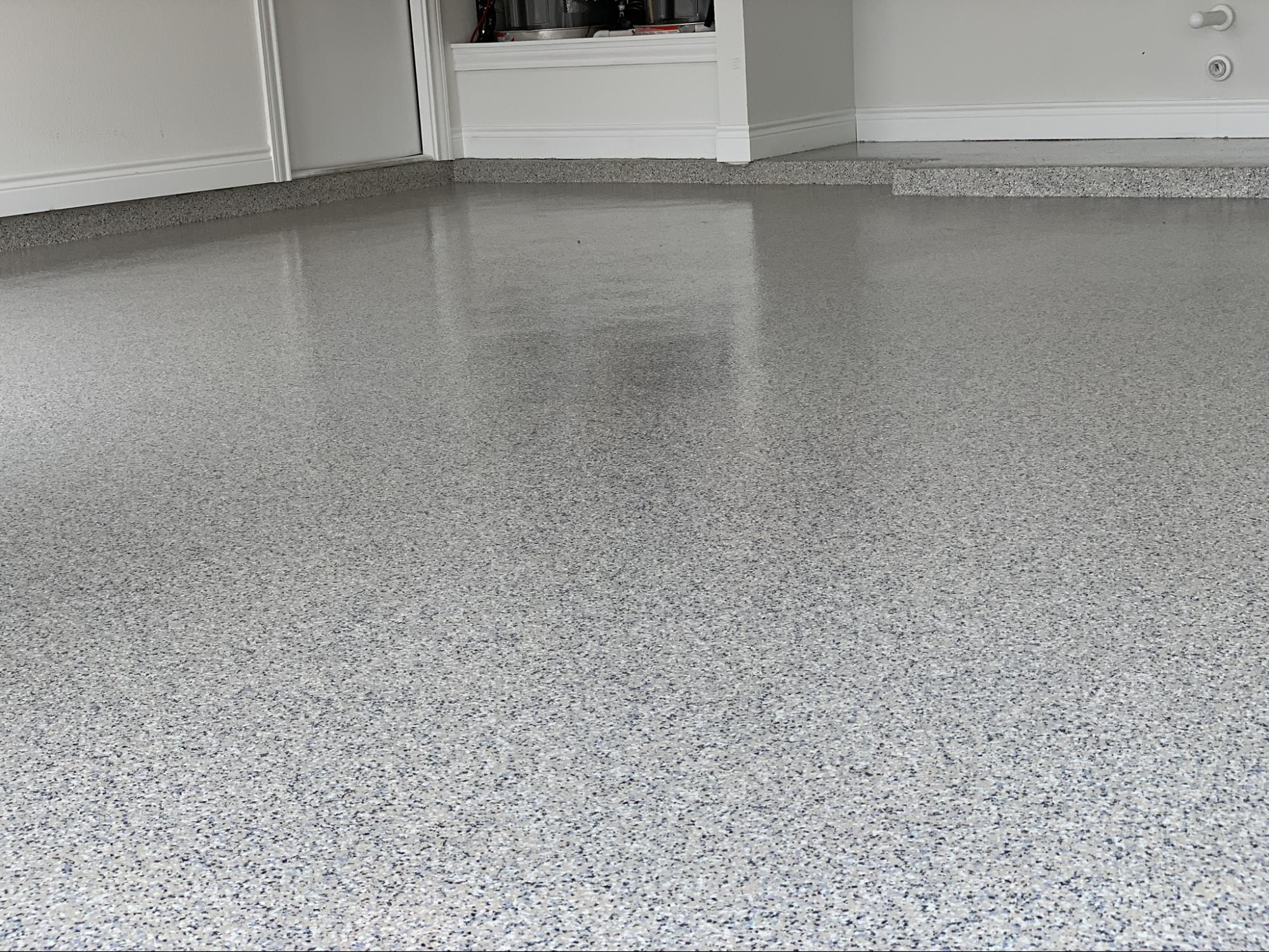 Polished garage floor with speckled finish